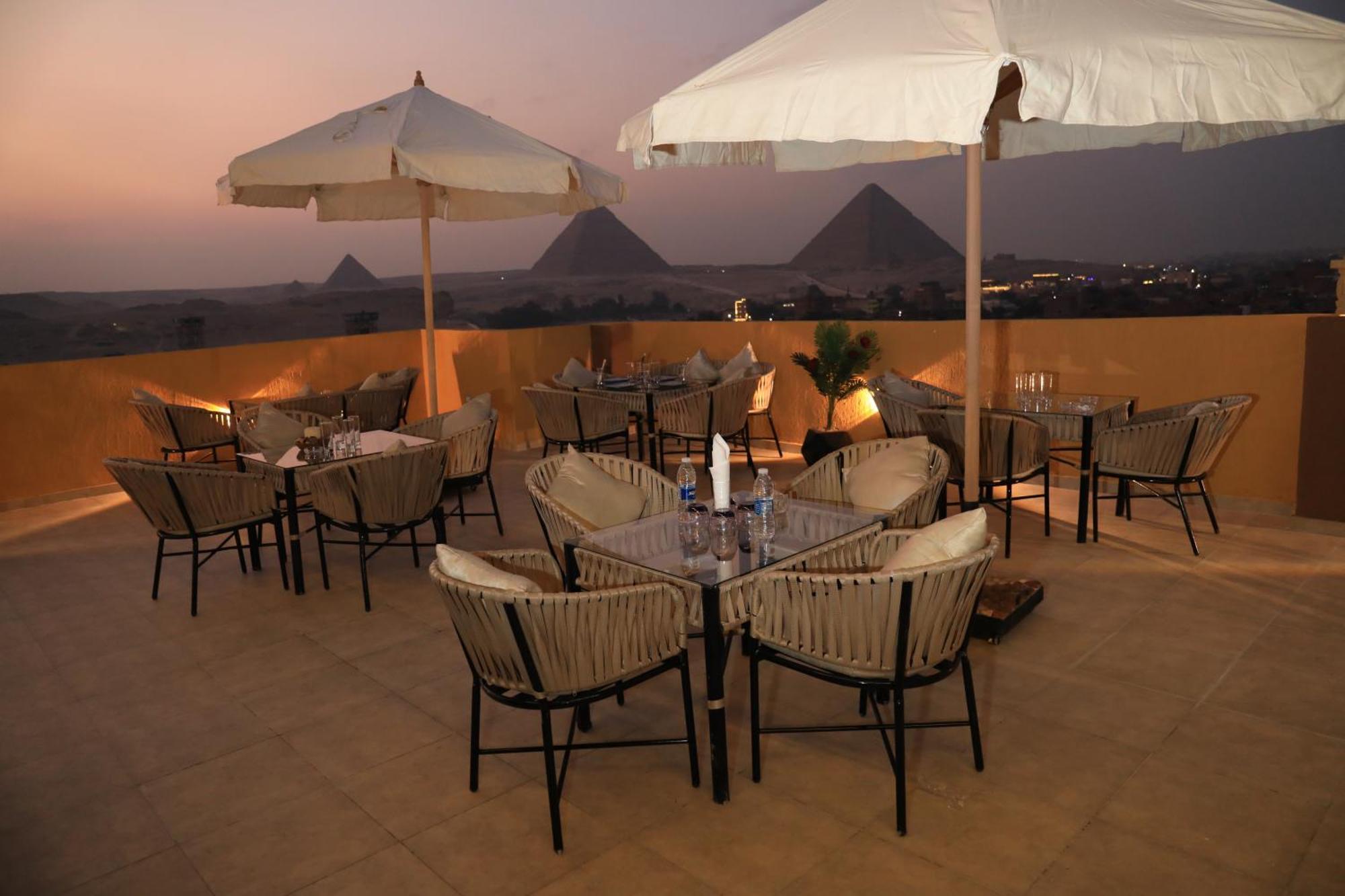 Pyramids Heart Hotel Kafret el-Gabal Extérieur photo