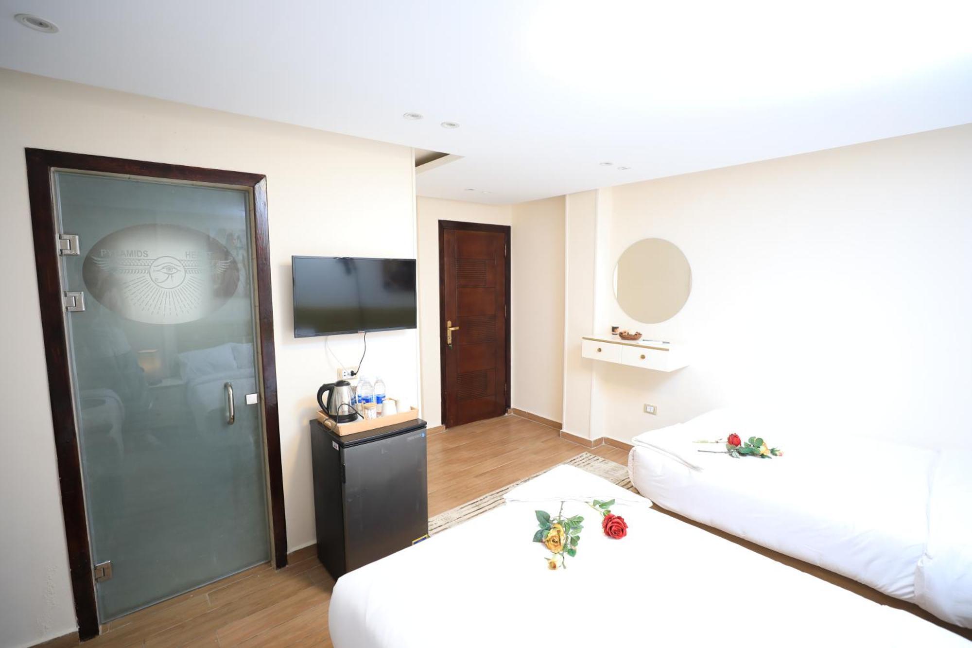 Pyramids Heart Hotel Kafret el-Gabal Extérieur photo